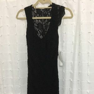 Professional black dress with unique back style